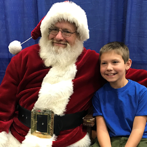 Caleb Busby visits with Santa at last year’s event. Courtesy of CLC YMCA