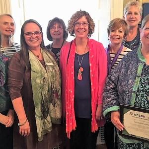 New Hope for Women’s board of directors celebrate Kathleen Morgan’s Champion of Change award from Maine Coalition to End Domestic Violence. From left are Diane Norton, Pat Aboud, Francine Garland Stark of MCEDV, Cyndi Ostrowski, Anne Conners, Sue Norton, Vera Roberts and Kathleen Morgan. Courtesy photo