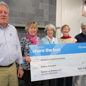 From left are Bruce, Jane and Maria McElman, Debbie Locke and Richard McElman, Jr. They are shown holding last year’s simulated check to the Woolwich Historical Society. The donation amount for this year will not be known until the promotion ends Jan. 2. PHIL DI VECE/Wiscasset Newspaper