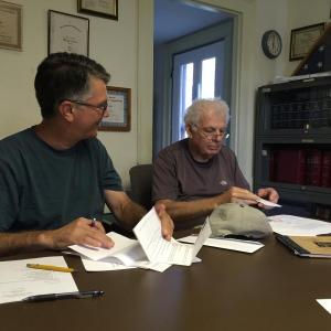 Alna Second Selectman Ed Pentaleri, left, and Third Selectman Doug Baston have a light moment. File photo