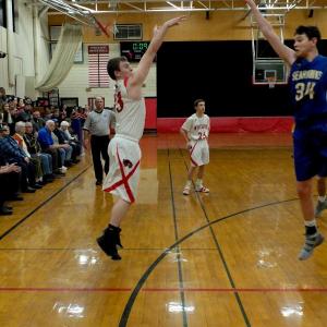 Haiden Dunning attempts a shot over Boothbay’s Ben Pearce. PHIL DI VECE/Wiscasset Newspaper