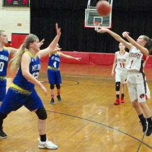 Brianna Orr launches a 3-point shot in the Wolverines' recent game with Mt. Abram. PHIL DI VECE/Wiscasset Newspaper
