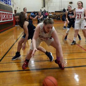 Kateleen Trask is pictured during the second period of Saturday’s game with the Cougars. That’s Madison Carrier #21 in the background. PHIL DI VECE/Wiscasset Newspaper