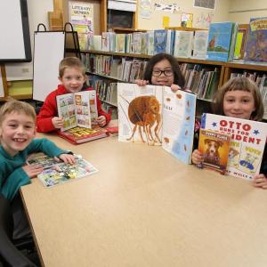 Pictured with their favorite books in the library at Wiscasset Elementary School are second graders, from left, Graham Oyster, Dominic Bowers, Leilani Doronio and Audrey Robinson. PHIL DI VECE/Wiscasset Newspaper