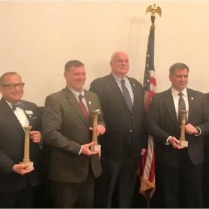 Maine Bureau of Veterans’ Services Director David Richmond, standing third in from left (red necktie), receives the 2019 Abraham Lincoln Pillar of Excellence Award. Courtesy of Sarah Sherman