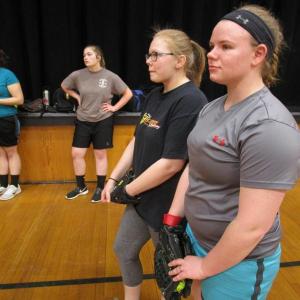 Ellie Pratt, left, Makayla Bailey, center, and Farrah Casey, three veterans from last year’s Wolverine softball team at a March 19 practice. Also shown is Joanna Collins. PHIL DI VECE/Wiscasset Newspaper