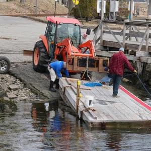 Some of the 34 volunteers work to get Wiscasset Yacht Club ready for the season. Carl Ward photo