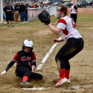 Sydnie Thayer attempts to make a play at home plate but the Hall-Dale runner slides in safely. PHIL DI VECE/Wiscasset Newspaper