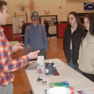 Teacher Neal Goldberg shows student demonstrators how to make ice cream in a bag. ART MAYERS/Wiscasset Newspaper