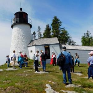 Participants on a past Lighthouse Adventure with Red Cloak Tours explore the lighthouse and outbuildings on Burnt Island. A portion of the proceeds from the June 1 tour will go to benefit the restoration campaign at the historic lighthouse. Red Cloak Tours photo