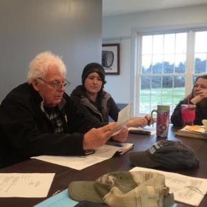Alna Second Selectman Doug Baston looks at a deed April 24 in the meeting room of the new town office. SUSAN JOHNS/Wiscasset Newspaper
