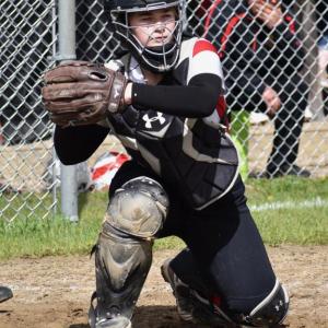 Farrah Casey worked behind the plate in game one against Hall-Dale and had a triple in game two against Spruce Mountain. PHIL DI VECE/Wiscasset Newspaper
