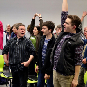 Tapestry Singers warm up in preparation for rehearsal. Courtesy of Barbara Burt