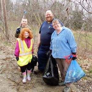 Christopher and Bonnie Wormwood and family, who lost their Westport Island home to fire in February and have appreciated the support they received from their community, took time out to give back by helping with the Westport Island Conservation Commission's annual "Keep the Island Green" cleanup. Courtesy of Gaye Wagner