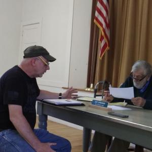 Edgecomb Fire Chief Roy Potter briefs selectmen on a fire truck found for sale in New York. JANE CARPENTER/Boothbay Register
