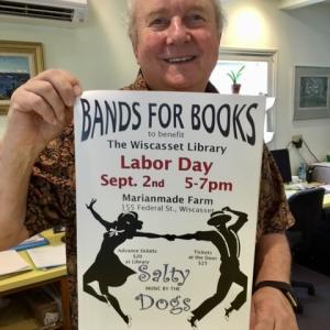 Carl Ward with the Wiscasset Public Library fundraiser poster he designed. Courtesy of Wendy Ross