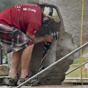 Artists, like Dan Ucci here, enthusiastically invite the public to interact with them and watch the sculptures develop, this year from July 27 to Aug. 4. It is sometimes noisy and dusty, but always fun. Courtesy photo Sculptor Dan Ucci