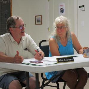 Selectmen Allen Greene and Allision Hepler discuss the town’s new website Monday evening. PHIL DI VECE/Wiscasset Newspaper