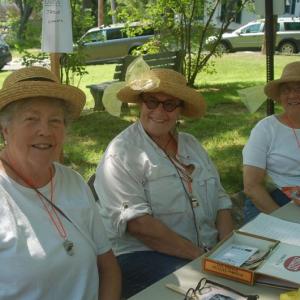 From left, the Poopettes, Joni Leigh, Deborah Morgan and Gretchen Burleigh Johnson register dogs for the parade. ART MAYERS/Wiscasset Newspaper