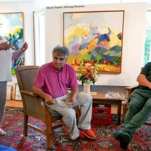Marty Gleason of Gleason Fine Art welcoming artist Henry Isaacs, left, and arts writer/historian Dan Kany during the August First Friday Art Tour. David Wade Photography