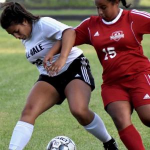 Latisha Wright takes on a Hall-Dale player. PHIL DI VECE/Wiscasset Newspaper