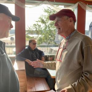 Bob Bond of Wiscasset and summer Wiscasset resident Frank Barnako chat before the start of Friends of Wiscasset Village’s Sept. 6 meeting at Sarah’s Cafe. SUSAN JOHNS/Wiscasset Newspaper