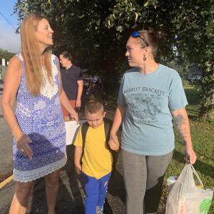 Wiscasset Superintendent of Schools and 2019-20 WES Principal Terry Wood greets pre-kindergartener Timothy Robbins, 5, and his mother Amanda Merritt on opening day, Tuesday, Sept. 3. SUSAN JOHNS/Wiscasset Newspaper