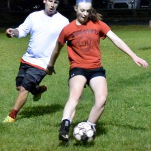 Grace Webber, class of 2018, and Russell Marr ’17 compete in WMHS’s annual Red verses White alumni game. PHIL DI VECE Wiscasset Newspaper