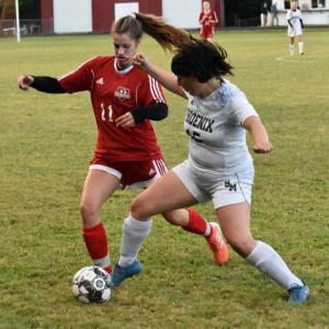 Wiscasset Middle High School rallied but visiting Spruce Mountain was the victor Tuesday. Shown are Cara Viele and Riley Gray of the Phoenix. PHIL DI VECE/Wiscasset Newspaper