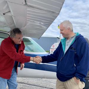 Clifford Dow, right, of New Gloucester greets the next pilot to arrive at Wiscasset Municipal Airport Oct. 11, Bangor’s Bob Ericson. SUSAN JOHNS/Wiscasset Newspaper