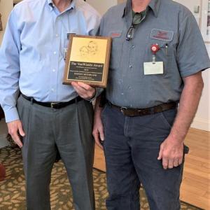 LincolnHealth President James Donovan presented this year’s Van Winkle Excellence in Health Care Award to longtime Maintenance Mechanic Harvey McFarland. Courtesy of LincolnHealth