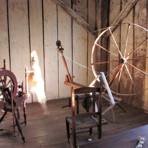 The flax wheel and great wheel spinning wheels are displayed in the kitchen of the Chapman-Hall House. Courtesy photo