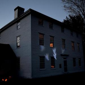 As darkness descends Oct. 19, ghostly images appear on Pownalborugh Court House in Dresden. PHIL DI VECE/Wiscasset Newspaper