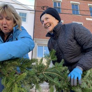 Terri Wells, left, and Linda Belmont help decorate downtown Wiscasset Nov. 23. SUSAN JOHNS/Wiscasset Newspaper