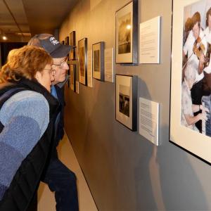 Grandson Eben Greenleaf and great-granddaughter Dedee Greenleaf-Hodgdon visit the “My Island Home” exhibit Dec. 6. Courtesy of Gaye Wagner