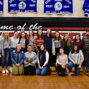 Todd Underwood, far right, representing the Midcoast Board of Approved Soccer Officials, presents the group’s 2019 Willy Walter Sportsmanship Award to Wiscasset Middle High School’s Wolverine girls’ varsity soccer team Jan. 18. At left are WMHS Athletic Director Warren Cossette and Wolverine Coach Duane Goud. Third and second from far right are Assistant Coach Todd Souza and Assistant AD Bob Applebee. Players, from left, are Zoe Waltz, Kaitlyn Main, Kayla Cossette, Jade Rego, Gwen Webber, Eliza Paradis, Kylie Peoples, Jasmine Rego, Kateleen Trask and Angie Haggett. And kneeling: Lily Souza, Latisha Wright, Carolyn Potter, Brianna Colson-Orr and D’Nisha Dawkins. PHIL DI VECE/Wiscasset Newspaper