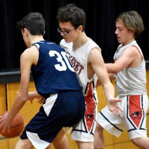 Johnny Spies and Dillon Leeman with Telstar’s Levi Cole-McDo. PHIL DI VECE/Wiscasset Newspaper