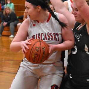 Emily Richardson grabs a first quarter rebound for Wiscasset. PHIL DI VECE/Wiscasset Newspaper