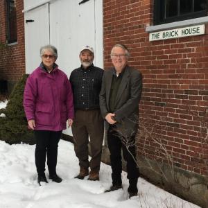 Frances Perkins Center executive director Michael Chaney, right, and board chair Sarah Peskin, left, assume stewardship of the Frances Perkins Homestead National Historic Landmark from Frances Perkins’ grandson Tomlin Perkins Coggeshall, center. Courtesy photo