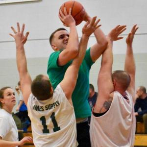 Ethan James with the ball helps lead Maxwell’s Market to a come from behind win over Ames Supply in the opening round of the Wiscasset Parks and Recreation adult basketball league’s tournament Feb. 23. PHIL DI VECE/Wiscasset Newspaper
