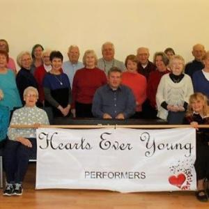 H.E.Y. cast members with musical director Sean Fleming during a recent rehearsal. Bob Gorrill photo