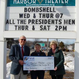 Harbor Theater Board President Hamilton Meserve, left, and Theatre Manager Lisa Perry, center, accepting the generous donation from Boothbay Harbor bank branch manager Brenda Blackman. Courtesy photo