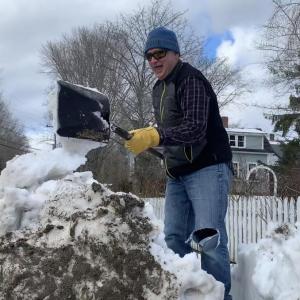 Steve Graffam gets snow off the Federal Street, Wiscasset sidewalk Saturday. SUSAN JOHNS/Wiscasset Newspaper
