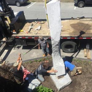 It was a tad stressful getting Miles Chapin’s “Expanse” level on its base at Tugboat Inn last week. LISA KRISTOFF/Boothbay Register