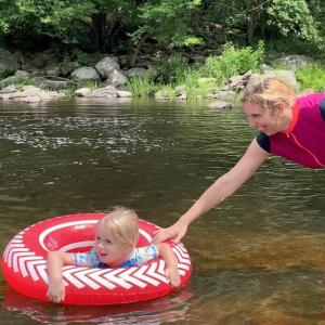 Avery Fairley, 3, and mother Jessica have fun at Head Tide Dam in Alna July 11. SUSAN JOHNS/Wiscasset Newspaper