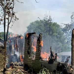 Fire finishes taking a home in a training burn on Woolwich’s Phipps Point Road Aug. 9. SUSAN JOHNS/Wiscasset Newspaper