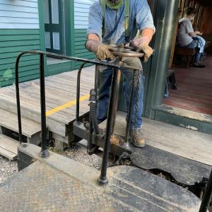 Volunteer Dana Deering helps work the train. SUSAN JOHNS/Wiscasset Newspaper