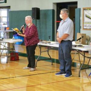 Chairman Judy Colby reads the town report dedication at the start of the Aug. 18 Wiscasset select board meeting. PHIL DI VECE/Wiscasset Newspaper