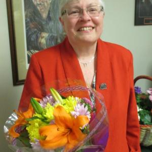 Alna’s acting town clerk Lynette Eastman takes in a 2017 celebration Woolwich gave her as she retired as town administrator. File photo