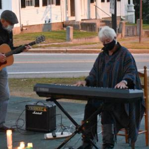 Terry Heller and Leo Egan play patriotic songs for the vigil. SARAH WHITFIELD/Wiscasset Newspaper